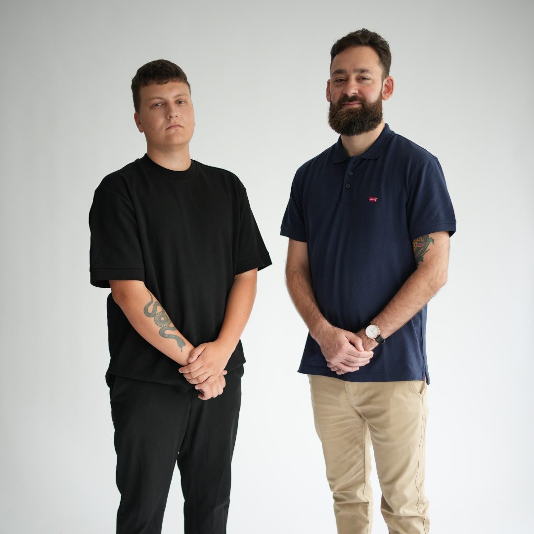 Yoann and a founder in a studio portrait
